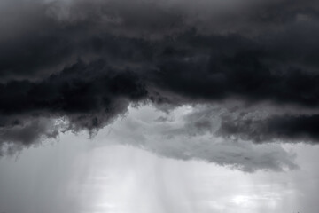 dark clouds make sky in black. Heavy rain thunderstorm. Pattern of clouds overcast predict tornado,...