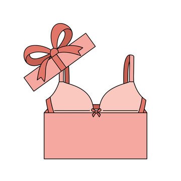 Pink bra in gift box with ribbon for holiday or celebration  