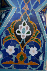 Samarkand , Uzbekistan 20 October, 2024: Guri Amir mausoleum closeup of tile mosaic of a flower