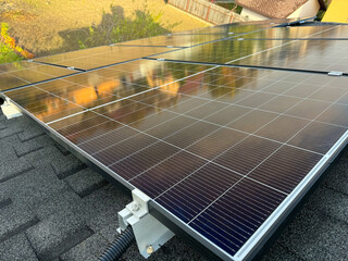 Renewable solar energy on a modern house rooftop