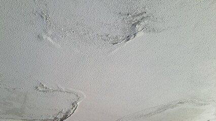 White background with water leak on the ceiling of the house.