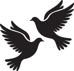 Obraz premium Two Black Birds Flying Freely Together In Flight