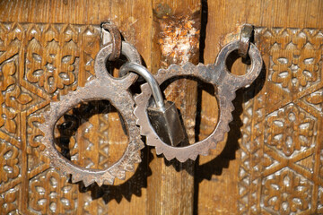 Samarkand , Uzbekistan 20 October, 2024: Guri Amir mausoleum door handles and lock