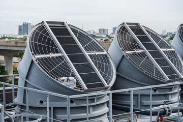 Cooling towers system, Chillers, Induced draft cooling towers on rooftop of building. Heating,...