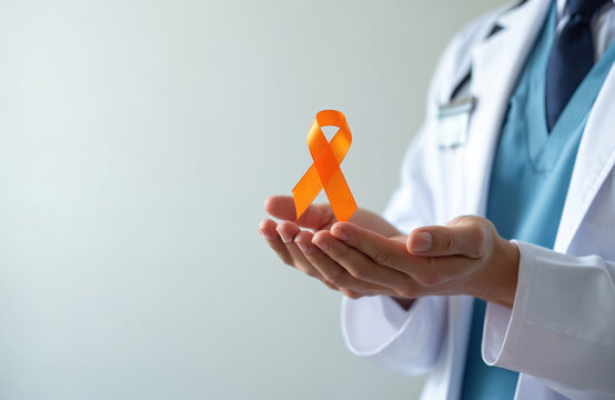 Doctor holding orange ribbon. Symbol of support for Leukemia, Kidney cancer awareness. Healthcare pro in medical uniform, supporting awareness campaigns, fighting diseases, honoring survivors.