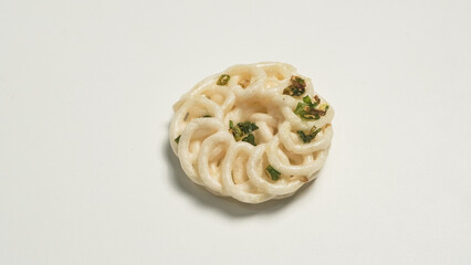 Delicate Spiral Pastry with Green Herbs, Top View