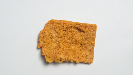 Single Crispy Snack Cracker on White Background