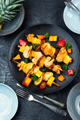 Meat skewers - grilled chicken breast and pineapple.