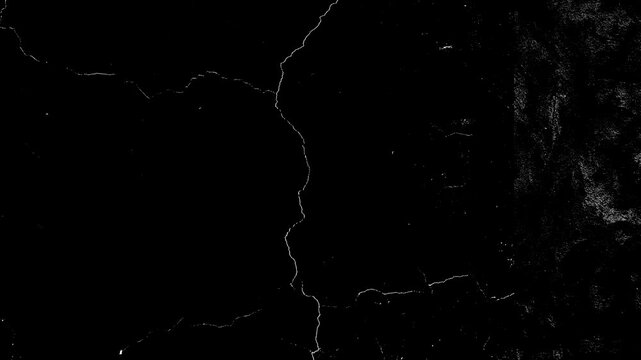Black and white screen mode grunge overlay dirt scratches looped animation vintage effect. 4K video