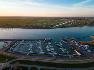 Aerial View of Jachthaven Streefkerk Marina Filled with Boats on a Sunny Day in the Netherlands