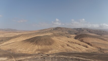 sunset from the ocean overlooking the desert area