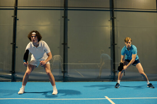 Exciting moments on the padel court with young athletes enjoying an intense match - Powered by Adobe