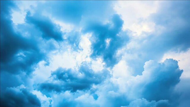 A dramatic sky with dark clouds and lighter shades of blue, suggesting a changeable weather condition.