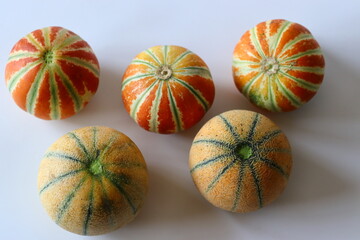 Madhu muskmelon also known as kharbooja and Kajari melon or Delhi melon displayed side by side