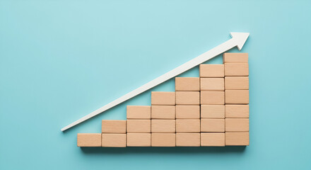 Wooden Blocks Forming a Growth Chart with White Arrow on a Blue Background Illustrating Business Success and Financial Progression