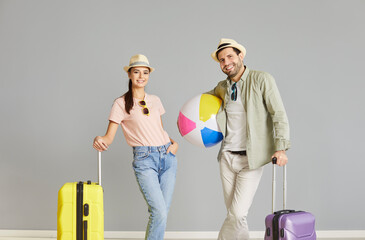Happy couple is filled with anticipation and joy as they prepare to set off on their summer...