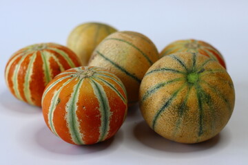 Madhu muskmelon also known as kharbooja and Kajari melon or Delhi melon displayed side by side