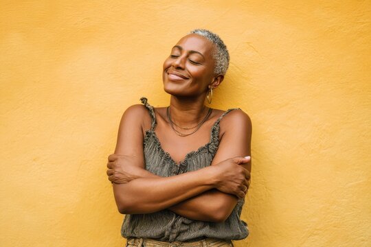 Self Care Black Woman. Happy Senior African American Woman Smiling Confidently, Embracing Herself with Joy and Self Love