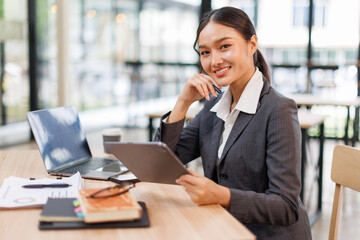 Business woman signs an electronic document on a digital document on a virtual tablet laptop...