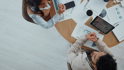 Business people, analytics and tablet with documents above for meeting, discussion or performance. Top view, businessman and woman with paperwork, statistics or technology for company review on space - Powered by Adobe