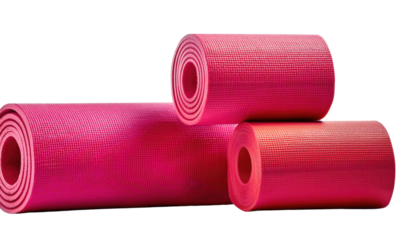 Rolled Yoga Mat: A captivating display of vibrant pink yoga mats, meticulously rolled, offering an invitation to tranquility, fitness, and inner peace.