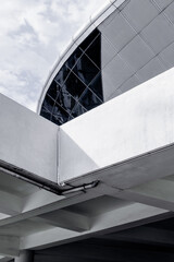 Modern architectural design with geometric shapes and glass facade