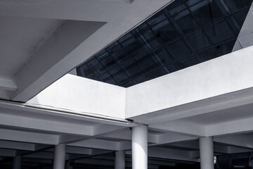 Modern architectural structure with geometric lines and reflections