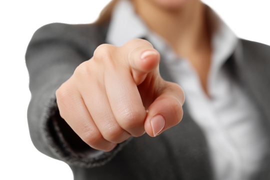 Smiling businesswoman pointing at camera PNG with a transparent background

