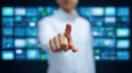 Person pointing finger at digital screen with multiple blue data panels in background, conveying focus and interaction