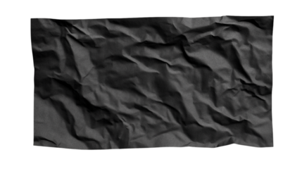 Wrinkled black paper isolated on white background