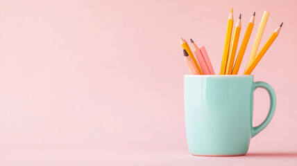 Back to school banner beige backdrop with pencil in a cup of coffee. School supplies and stationery, other elements in pink mint empty background with space for text