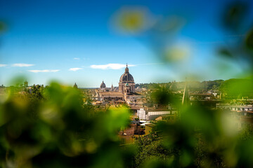 Spectacular view of Rome during the warm sunny afternoon and blue sky Italy