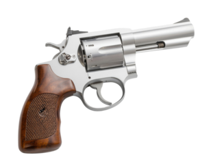 Old silver revolver handgun in vintage classic style isolated on white background
