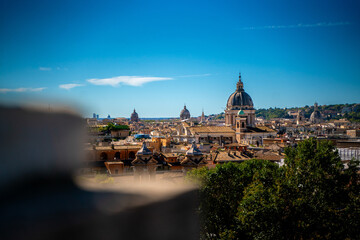 Spectacular view of Rome during the warm sunny afternoon and blue sky Italy