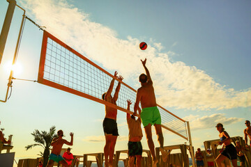 silhouette of beach Volleyball player on the beach in sunset
