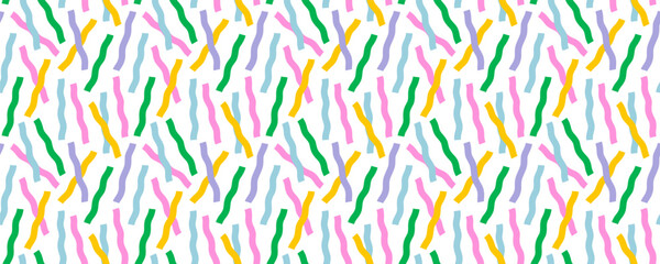 Seamless pattern background with wavy ribbon confetti in pink, green, yellow, blue and purple on white. Wavy ribbon pattern in bright colors. Perfect for fabric, wrapping, packaging. Drag to swatches.