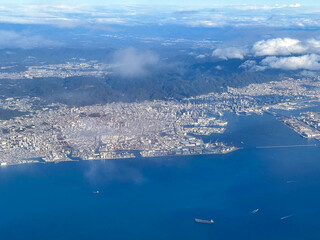 Aeria view of Kobe city with rokko mountain on osaka bay Japan.