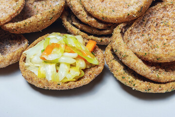 Close-up of rye bread toast with mixed vegetables