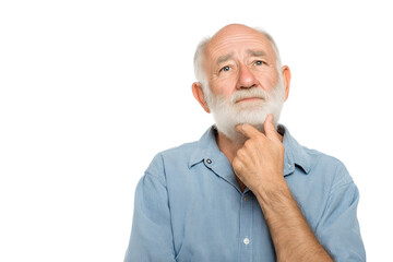 Fototapeta premium Thoughtful senior man in light blue shirt looking upwards isolated on white background