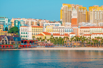 Colorful coastal cityscape with vibrant architecture, multicolored buildings and tropical vibe in...