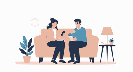 Young Professionals Collaborate Sitting On Sofa During Project Planning Discussion