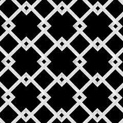 Seamless tile background. Black background with white ornamental pattern. Ancient pattern for floors and cladding. Geometric seamless pattern. Ornamental vintage background