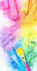 Colorful powder pigments with assorted paintbrushes