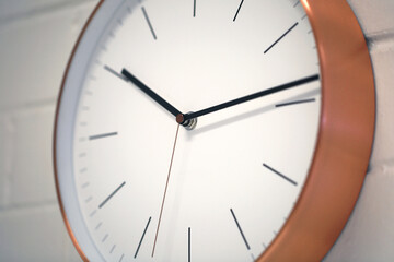 Close up shot of a round wall clock