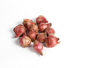 pile of red onions isolated on white background.concept of kitchen spices