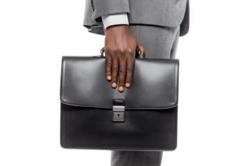  businessman holds black briefcase isolated on white background