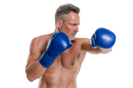  determined middle-aged boxer throwing  punch isolated on white background