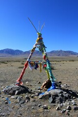 An example of an obo in Mongolia. A sacred ovo dedicated to the mountain spirit. A votive offering...