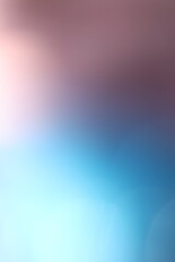 Abstract blur of blue and pink light gradient with soft focus