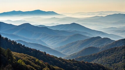 Layers of blue mountain ranges fade into the hazy horizon in a scenic vista
